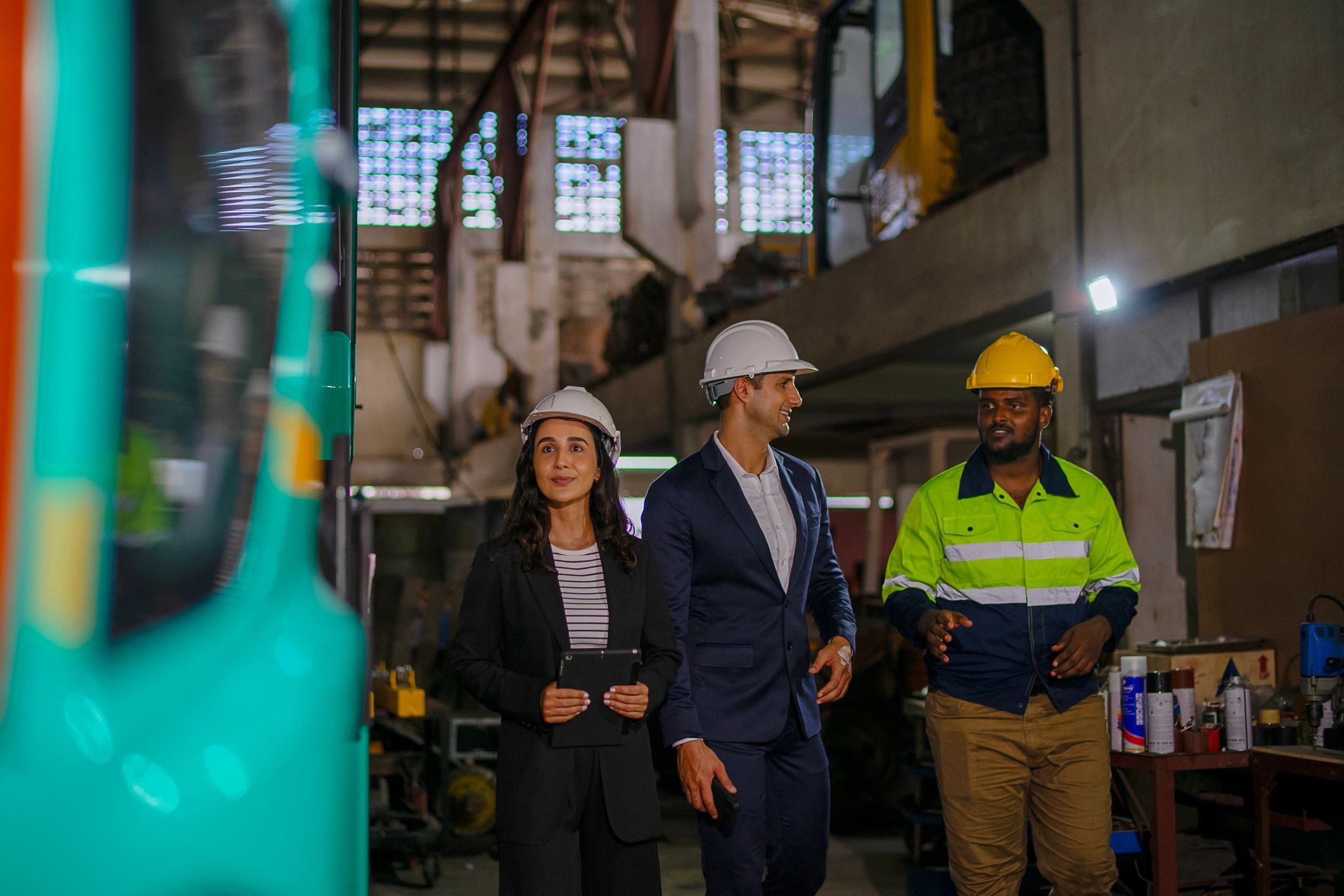 Engineer and project stakeholder meeting at a construction site